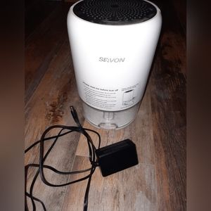 Dehumidifier with color changing light option